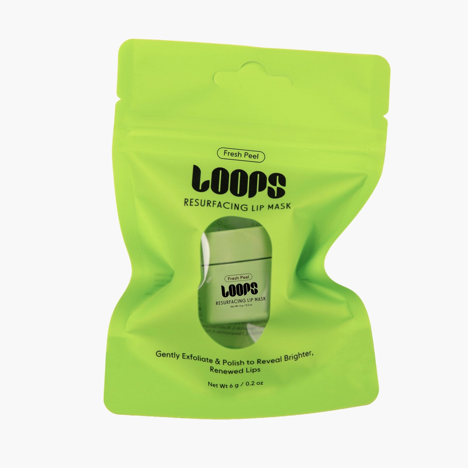 Green lip mask packaging with 'LOOPS' branding on a white background