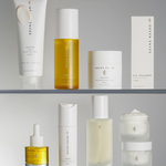 Collection of skincare products on a gray shelf with 'Green Eves' branding.